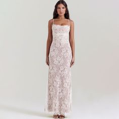 Description: This romantic two-piece lace dress is a love letter to feminine grace. Beautifully crafted with delicate floral lace and a soft lining in a cream and nude combo, the set features a cute cropped lace shrug with long sleeves and a sleeveless maxi dress adorned with a square neckline, spaghetti shoulder straps, and a graceful mermaid hemline. The lace-up closure at the back and meticulously ruched waist accentuate your figure with a whisper of old-world romance. Find more trendy lace d Long Sleeve Shrug, Lace Shrug, White Lace Maxi Dress, White Lace Maxi, Vintage Inspired Outfits, Romantic Lace, Floral Lace Dress, Lace Corset, Maxi Dress Evening