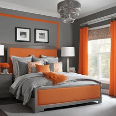 a bedroom with orange and gray decor