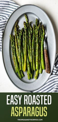 asparagus on a plate with a knife and fork