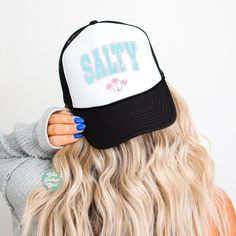 Salty women's foam trucker hat, perfect gift for the beach lover! -One size fits most. Circumference of the hat is about 24in. -Adjustable back -Foam Trucker Hat ♡ DISCLAIMERS: - Colors may vary depending on the device you are viewing them on This item is made especially for you as soon as you place an order so it can take a little longer to deliver it to you.  Please be sure to check our shipping & policies page for more information on production, shipping times, & cancellation policy. We don't White Letter Print Hat For Vacation, Trucker Snapback Hat With Curved Brim For Vacation, Trendy White Trucker Hat For Vacation, Summer Letter Print Hat For Gift, Summer Snapback Trucker Hat For Vacation, Beachy Adjustable Trucker Hat For Vacation, Letter Print Hat For Vacation And Beach Season, Trendy Snapback Hat With Flat Brim For Beach, Trendy Snapback Cap For Vacation