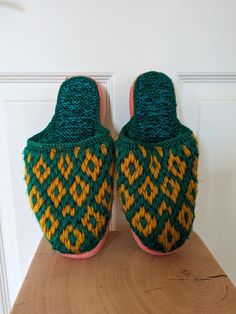 Fun green, yellow and pink knitted slippers with plastic bottom Perfect for winter or fall  Slightly worn Yellow Slip-on Winter Slippers, Green Comfortable Slippers With Round Toe, Comfortable Multicolor Slip-on Slippers, Green Non-slip Closed Toe Slippers, Multicolor Non-slip Flat Slippers, Green Casual Slip-on Slippers, Casual Green Slip-on Slippers, Casual Winter Yarn Slippers, Comfortable Multicolor Flat Slippers