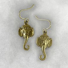 Introducing our stunning silver and gold plated silver Indian elephant earrings! Embrace the majestic beauty of elephants with these exquisite pieces of jewellery that capture the grace and elegance of these magnificent creatures. Handcrafted with love and attention to detail, each pair of earrings is a true masterpiece. Wear them with pride and show your love for elephants while adding a touch of elegance to any outfit. Order now and let these beautiful elephants adorn your ears with style and Gold Temple Jewelry Earrings In Sterling Silver, Gold-toned Sterling Silver Temple Jewelry Earrings, Temple Jewelry Style Drop Plug Earrings As Gift, Gold Sterling Silver Earrings With Latkans, Gold Latkans Earrings In Sterling Silver, Spiritual Nickel-free Yellow Gold Earrings, Spiritual Yellow Gold Brass Earrings, Spiritual Bronze Earrings Gift, Bronze Spiritual Earrings As Gift