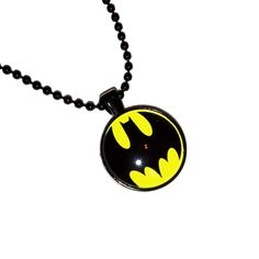 Handcrafted From Glass And Steel. One Inch Graphic, 22 Inch Chain Lead And Nickel Free Complimentary Gift With Purchase Halloween Themed Black Necklace, Black Themed Necklace For Halloween, Themed Black Necklace For Halloween, Black Novelty Jewelry For Gifts, Themed Black Jewelry Gift, Themed Black Jewelry As Gift, Adjustable Black Themed Necklace, Novelty Black Round Jewelry, Black Round Novelty Jewelry