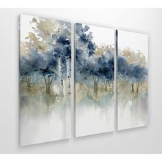 three paintings on the wall with trees painted in blue and white colors, each one being an abstract painting