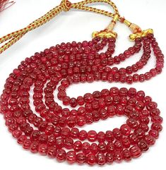 Rare Ruby Corundum Melon Beads Ruby Hand Carved Beads Ruby Pumpkin Shape Beads Ruby Gemstone Beads Item Code :- Necklace- Name :-  RUBY Corundum  Necklace Color = Pink  Necklace Length :- 18 Inches Beads Size :- 5 to 6 MM Necklace Weight :-  Quantity :- 1 Stand Gemstone Type :- Natural (treated & heated) Quality :- AA to AAA THANK YOU We accept bulk or wholesale orders for any gemstone which you'll get best wholesale prices! Hence you can contact me with your requirement of bulk or wholesale order. I'll be happy to fulfill your order. ----------------------------------------------------------------------------------------------- Shipping: ----------------------------------------------------------------------------------------------- WORLD WIDE SHIPPING 10-21 days UPGRADE SHIPPING  Fast shi Spiritual Style Faceted Round Beaded Necklaces, Spiritual Style Round Faceted Beads Necklace, Traditional Ruby Gemstone Beaded Necklace, Traditional Ruby Gemstone Beaded Necklaces, Festive 8mm Round Bead Necklace, Round Ruby Beaded Necklace With Polished Beads, Festive Spacer Beads, Round Shape, Festive Spacer Beads Round, Festive Spacer Beads