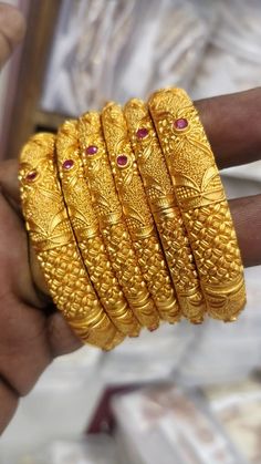 #temple jewelry available at Arshi's.. for bookings whatsapp on 9486115312. worldwide shipping Trendy Gold Bangles, Kangan Design, Stylish Gold Earrings, Gold Bangles Set, Gold Earrings Design, Marriage Jewellery, Aesthetic Edgy