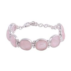 Featuring innocent, soft pink hues, glittering rose quartz gemstones circle the wrist in this bracelet from India. Neetu Barathi designs the bracelet, connecting the stones with sterling silver links. A lobster claw clasp and adjustable chain complete the accessory. Rose Quartz Color, Quartz Gemstones, Silver Link Bracelet, Rose Quartz Gemstone, Sterling Silver Cuff Bracelet, Pink Gemstones, Quartz Rose, Sterling Silver Cuff, Pink Bracelet