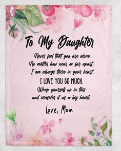 a pink blanket with flowers and the words to my daughter