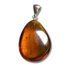 Natural Baltic Cognac Drop Amber Pendant Natural Baltic Cognac Drop Amber Pendant, 925 Sterling Silver Bail, with Inclusions. This Beauty is adorned with nature's inclusions, small treasures encapsulated in amber that whisper tales of ancient landscapes and the passage of time. 44X23mm. You will receive one Pendant. Arrives to your home with the "All About Amber" Brochure which includes care instructions. Classic Amber Pendant Jewelry, Brown Baltic Amber Jewelry With Polished Finish, Amber Teardrop Cabochon Jewelry, Amber Jewelry With Natural Inclusions As Gift, Brown Pendant Jewelry With Natural Inclusions, Baltic Amber Drop Jewelry In Amber, Baltic Amber Drop Jewelry In Amber Color, Classic Amber Teardrop Jewelry, Baltic Amber Hallmarked Jewelry