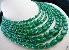 PRODUCT DETAILS LINE 8/CTS 512 EMERALD LONG BEADS OLD NATURAL ZAMBIAN MINES EMERALD SIZES OF THE EMERALD ARE FROM 11MM TO 3MM NECK LENGTH OF THE NECKLACE IS 18 INCHES OUTER LENGTH OF THE NECKLACE IS 22 INCHES NON REPEATABLE OLD ANTIQUE EMERALD NECKLACE FINE GREEN EMERALD COLOR WELL MATCHED BEADS ATTACHED TO SIZABLE SILK CORD NOTE - #You will receive the same product you see in picture. #DEAR ETSY BUYERS PLEASE FEEL FREE TO ASK QUESTIONS #WE WILL BE GLAD TO ANSWER & SOLVE QUERY REGARDING THIS PRO Old Estate, String Necklace, Emerald Color, Emerald Necklace, Silk Cord, Rajasthan India, Bead Stringing, Green Emerald, Old Antiques