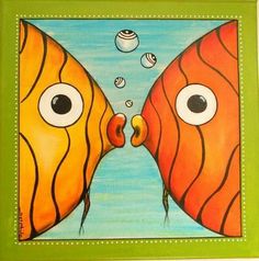 two orange fish facing each other with eyes