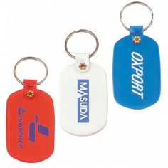 three different colored key chains with the words today on them and an orange, blue, and white tag attached to it