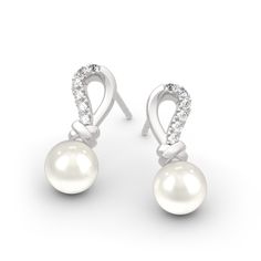 Simple but not plain, this pair of earrings makes a little lovely gift for loved one or yourself. Crafted in sterling silver, inspired from contemporary style, this pair of earrings shows an elegant look with its knot design. Two 7mm pearls and shimmering round stones are set on the knot to add extra sparkle to it. Treat yourself or surprise her with this piece.Carat Weight: 5.342 ctStone Size: 1.5,7 mmStone Type: Jeulia® StoneNumber of Stones: 14 Stone Color: Diamond WhiteStone Shape: RoundWeig Elegant Sterling Silver Pearl Earrings With Ear Wire, Elegant Sterling Silver Pearl Earrings For Evening, White Sterling Silver Earrings With Elegant Design, Elegant White Sterling Silver Earrings, White Sterling Silver Earrings For Evening, Elegant Sterling Silver Pearl Earrings For Formal Occasions, Modern Sterling Silver Bridal Earrings, White Sterling Silver Bridal Earrings For Evening, Elegant White Sterling Silver Bridal Earrings