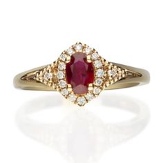 Stunning, timeless and classy eternity Unique ring. Decorate yourself in luxury with this Gin & Grace ring. The 10k Yellow Gold jewelry boasts 4X6 Oval-Cut Prong Setting Genuine Ruby (1pcs) 0.53 Carat and Round-Cut Prong Setting Diamond (18pcs) 0.13 Carat accent stones for a lovely design. This ring is weight 2.26 grams. Crafted with 10k Yellow Gold, this delicate Ring is polished to a high finish shine. Classic Ruby Ring With Halo Design For Promise, Elegant Ruby Wedding Ring With Halo, Classic 14k Gold Ruby Ring With Diamond Accents, Classic Ruby Ring With Diamond Accents In 14k Gold, Classic Ruby Ring With Diamond Halo Design, Classic Yellow Gold Birthstone Ring With Halo, Elegant Birthstone Ring With Halo Setting, Classic Ruby Ring With Halo Design, Classic Ruby Ring With Halo Setting