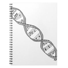 a spiral notebook with music notes on the pages and a drawing of a double strand of musical