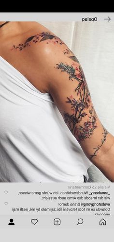 a woman with a flower tattoo on her arm is looking at an instagramt