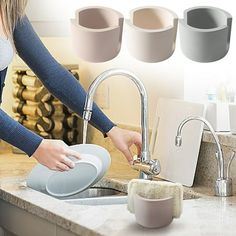 a woman washing dishes in a kitchen sink with cups on the counter and plates hanging from the faucet