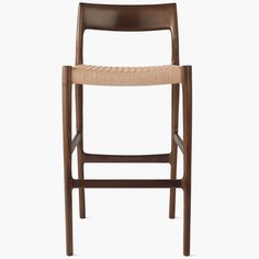 a wooden chair with a tan seat and back rest on a white background, it's not very easy to see in this photo