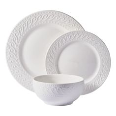 white dinnerware set on a white background