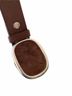 A dark brown suede belt buckle is a wardrobe staple that really makes a fashion statement. The oval suede buckle is easy to add to your favorite belt. Dress up your outfit with some bling when it needs a little extra something. The buckle can be paired with many of Brooklyn Buckles interchangeable snap belts.  This listing is for a buckle only but the belt can be purchased for an additional cost. This buckle looks great with a brown belt.  The buckle fits belts up to a belt width of 1 1/2 inches Oval Belt, Cowgirl Belt, Leather Belt Buckle, Handmade Leather Belt, Western Belt Buckles, Western Belt, White Plains, Online Friends, Belt Dress