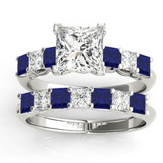 a princess cut diamond and blue sapphire engagement ring set with matching band in white gold