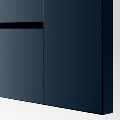 a close up of a black cabinet on a white wall