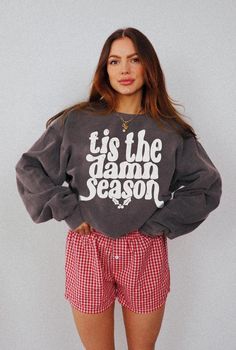 Tis the Damn Season Sweatshirt Comfort Colors® Christmas Crewneck Taylor Fan Gifts for Her Him Evermore Hoodie Holiday Sweatshirt Cozy Winter Sweater Oversized Sweatshirt  Shop all The June Kind - https://www.etsy.com/ca/shop/TheJuneKind? ---------- Please read before placing your order -------------- 1. This apparel is GENDER NEUTRAL / UNISEX. The relaxed fit is flattering for all bodies. 2. Refer SIZE CHART for measurements. Size up for oversized looks. 3. PRODUCT is Premium Comfort Colors® 1566 Unisex Crewneck Sweatshirt - 80% ring-spun cotton and 20% polyester, medium-heavy fabric, 100% cotton super-soft fleece inside, relaxed fit, rolled-forward shoulder and back neck patch. Please note the Comfort Colors Crewnecks are solid colors - not acid wash, not patterned, not tie-dye. 4. COLOR Christmas Relaxed Fit Sweatshirt For Loungewear, Relaxed Fit Christmas Loungewear Sweatshirt, Casual Christmas Sweatshirt With Letter Print, Christmas Cotton Sweatshirt For Loungewear, Christmas Letter Print Sweatshirt Loungewear, Christmas Letter Print Sweatshirt For Loungewear, Christmas Sweatshirt With Letter Print In Relaxed Fit, Christmas Sweatshirt With Letter Print, Christmas Sweatshirt With Letter Print And Relaxed Fit