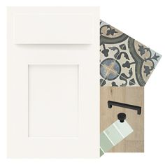 a white door and some wallpaper next to it