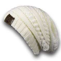 • 100% Acrylic Cable Knit• 8" Wide by 8" Tall; Stretches to about 11" Wide• A Badass Beanie that's as Wild and Adventurous as You!• Recommended for everyone with a head. Slouch it and Stretch it Your Way• Trendsetting Style• Built Tough to Outlast Other Beanies• Makes a Smashing Good Gift so Gift Like a Rockstar When the temperature drops, turn to the Freestyle Beanie from Deadwood Trading Company to keep you looking and feeling sizzling hot! The original Freestyle beanie stretches and slouches as little or as much as you want to create a trendy look that's comfortable and oh so warm. Warm doesn’t even begin to describe how you’ll feel in the thick, super soft cable knit beanie. It has a skull cap design with an offset sewn on Deadwood Trading Company logo patch. Laying flat this cap is ab White Adjustable Beanie For Cold Weather, White Outdoor Hat, One Size Fits All, White Acrylic Yarn Beanie For Winter, White Hat For Outdoor, White One-size Hats For Outdoor, White Casual Acrylic Beanie, White One-size Outdoor Hat, White Acrylic Casual Beanie, White Acrylic Hat For Fall