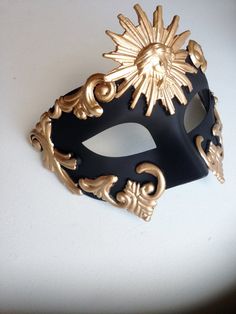 The Mask base is painted in a rich black shade and the embellishing pieces are painted in a brilliant Gold using high quality paints. Other Color combinations also available. S H I P P I N G - Processed same day or within 24 hours. 1-2 day guaranteed delivery services offered, add items to cart and click on shipping tab for rates. Pls leave a check out note with your need date & contact number (especially for expedited and custom orders) Msg for delivery time frames (Include your state/count Black Masquerade Mask For Party And Festivals, Black Masquerade Mask For Party Festivals, Black Masquerade Mask For Festivals, Black Masquerade Mask For Carnival, Venetian Black Masquerade Mask For Festivals, Vintage Black Masquerade Mask, Black Masquerade Mask For Festivals And Costume Party, Artistic Black Masquerade Mask For Carnival, Masquerade Event