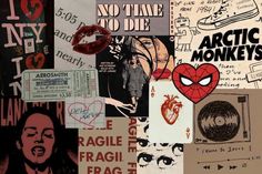 an assortment of posters and stickers on the side of a wall with words written all over them