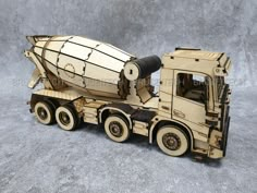 a wooden model of a cement truck