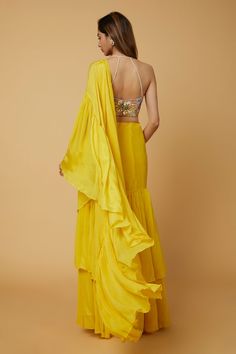 Yellow solid lehenga with ruffled tiers detailing. Paired with a halter neck bustier style blouse with all over fleur embroidery and a ruffle tiered dupatta. - Aza Fashions Solid Lehenga, Tiered Lehenga, Lehenga Pattern, Silk Embroidery, Set For Women, Aza Fashion, Halter Neck, Lehenga, Krishna