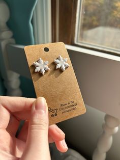 With these snowflake earrings, add some Christmas shimmer to your wardrobe, or give as a gift this holiday season!  Available in blue shimmer or white pearl; as studs or dangles. Snowflake Shaped Jewelry With Matching Earrings For Gifts, Handmade Snowflake Earrings As Gift, White Snowflake Jewelry Gift, White Snowflake Jewelry For Gifts, White Snowflake Earrings For Christmas, White Snowflake Earrings For Gift, White Snowflake Earrings For Winter, Snowflake Earrings For Winter Gift, Winter Snowflake Earrings For Gifts