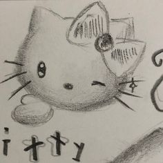 a drawing of a cat with the word kitty written in it's ear and tail