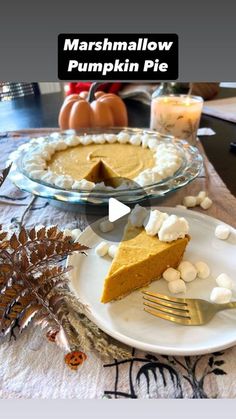 there is a piece of pumpkin pie on the table with marshmallows around it