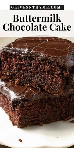 a close up of a piece of cake on a plate with the words buttermilk chocolate cake