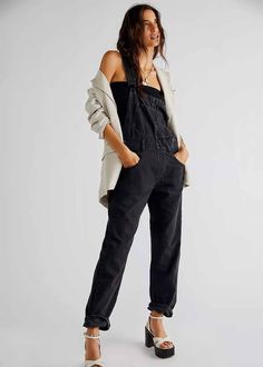 So essential and forever timeless, these special denim are featured in a relaxed, slouchy silhouette with tapered legs and exaggerated pocket detail for added dimension. Relaxed, slouchy silhouette. Bib-and-brace design. Tapered legs. Exaggerated bib pocket detail. Rigid denim fabrication. 100% cotton. Model is wearing size S. Free People Overalls, Free People Style, Denim Overalls, Black Fits, Swimwear Accessories, Pocket Detail, Swimwear Tops, Tapered Legs, Boho Outfits