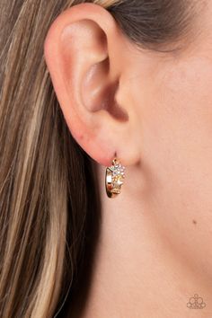 A shiny gold bar curls around the ear into a dainty hoop. Three gold stars gradually increase in size as they climb the curve of the hoop, with the biggest star emblazoned with iridescent crystal-like rhinestones across its surface. Earring attaches to a standard post fitting. Hoop measures approximately 1/2" in diameter. Due to its prismatic palette, color may vary. Sold as one pair of hoop earrings. Iridescent Crystal, Palette Color, Paparazzi Accessories, Silver Bars, Paparazzi Jewelry, White Earrings, Gold Bar, White Crystal, Big Star