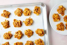 there are many cookies on the tray ready to be baked in the oven and eaten