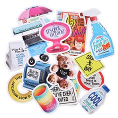 a pile of various stickers and decals on top of each other with an umbrella in the background