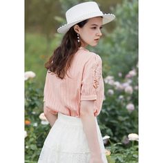 Discover Elegance and Comfort Introducing our Elegant Floral Embroidered Summer Blouse, designed to bring a touch of grace and sophistication to your warm-weather wardrobe. Crafted with care and attention to detail, this blouse is the perfect blend of style and comfort, ensuring you look and feel your best during the summer season. Product Features Our blouse boasts a delicate floral embroidery that enhances its fresh and clean design, while a stylish stand collar adds a chic and modern touch. The short sleeves keep it cool and casual for those hot summer days. Constructed from high-quality cotton, this blouse offers both durability and breathability, keeping you comfortable as you move through your day. Material: High-quality cotton for breathability and comfort Sleeve Length: Short, perf Summer Long Sleeve Embroidered Lace Top, Long Sleeve Embroidered Lace Top For Summer, Feminine Cotton Embroidered Top, Day Out Floral Embroidered Short Sleeve Top, Floral Embroidered Short Sleeve Top For Day Out, Fitted Feminine Embroidered Top, Feminine Embroidered V-neck Blouse, Spring Feminine Blouse With Lace Trim, Summer Long Sleeve Embroidered Top With Lace Trim