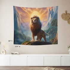 a lion standing on top of a hill in front of a sunset wall hanging tapestry