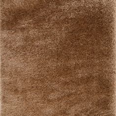 an area rug with brown shaggy on it