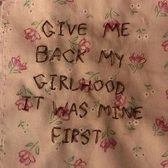 the words give me back my childhood it was mine first written on a piece of cloth