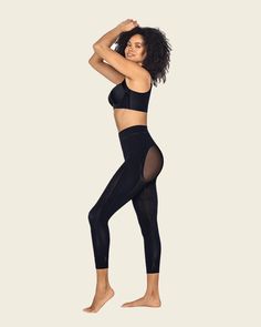 This high-waisted capri shaper has super comfy compression for smoothing from your waist down to your mid-calf. It's made with our SkinFuse® fabric: seamless for an invisible look under clothing. This shaper has targeted compression for a little extra smoothing from the waist down to the outside of the thighs. The back has cutouts of lighter fabric for a butt-lifting effect and the ankles have a flex-fit design for comfort. This seamless style won't show through, even under your tightest pants! Compression Shapewear With Built-in Bra For Yoga, Seamless Shapewear Activewear, Seamless Compression Shapewear For Athleisure, Compression Activewear With Medium Bust Support, High Waist Seamless Shapewear For Yoga, Compressive Shapewear Hosiery, Compressive Smoothing Athleisure Shapewear, Compressive Smoothing Shapewear In Athleisure Style, Sculpting Seamless Solid Tights