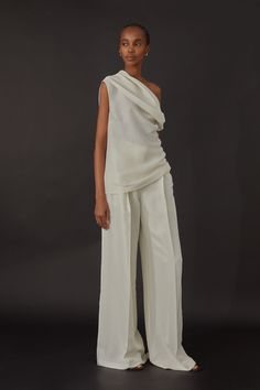 Wide-leg, pleat tailored trousers in Italian silk shantung fabric. Details include interior waistband curtain, belt loops and slash pockets. Fully lined in silk habotai. Wear it with Frida Top, Isabel Top or Luisa Blazer in the same fabric. Feminine Silhouette Fashion, White Silk Trousers, Wedding Dress With Pants, White Trousers Outfit Casual, Shirt And Trousers Women, White Trousers Outfit, White Matching Set, Trousers Outfit Casual, Body Silhouette