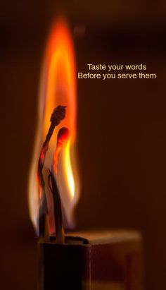 two toothbrushes in front of a lit candle with the words taste your words before you serve them