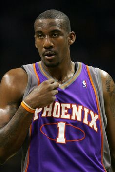 a close up of a basketball player wearing a jersey