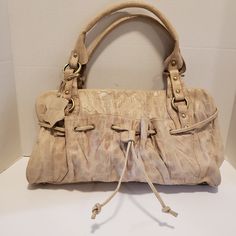 Charlie Lapson Corc Embossed Cream Handbag .New Never Used Any Tiny Flaws Are From Storing Only Measures Approx 17" X 9 1/2" Handles 10". Cream Satchel With Handle Drop For Daily Use, Beige Pouch Shoulder Bag With Handle Drop, Beige Leather Shoulder Bag With Adjustable Handle, Beige Rectangular Hobo Bag With Handle Drop, Cream Satchel Shoulder Bag With Handles, Rectangular Beige Hobo Bag With Handle Drop, Cream Leather Satchel With Adjustable Handle, Beige Hobo Bag With Handle Drop For Daily Use, Beige Hobo Bag With Adjustable Handle For Shopping